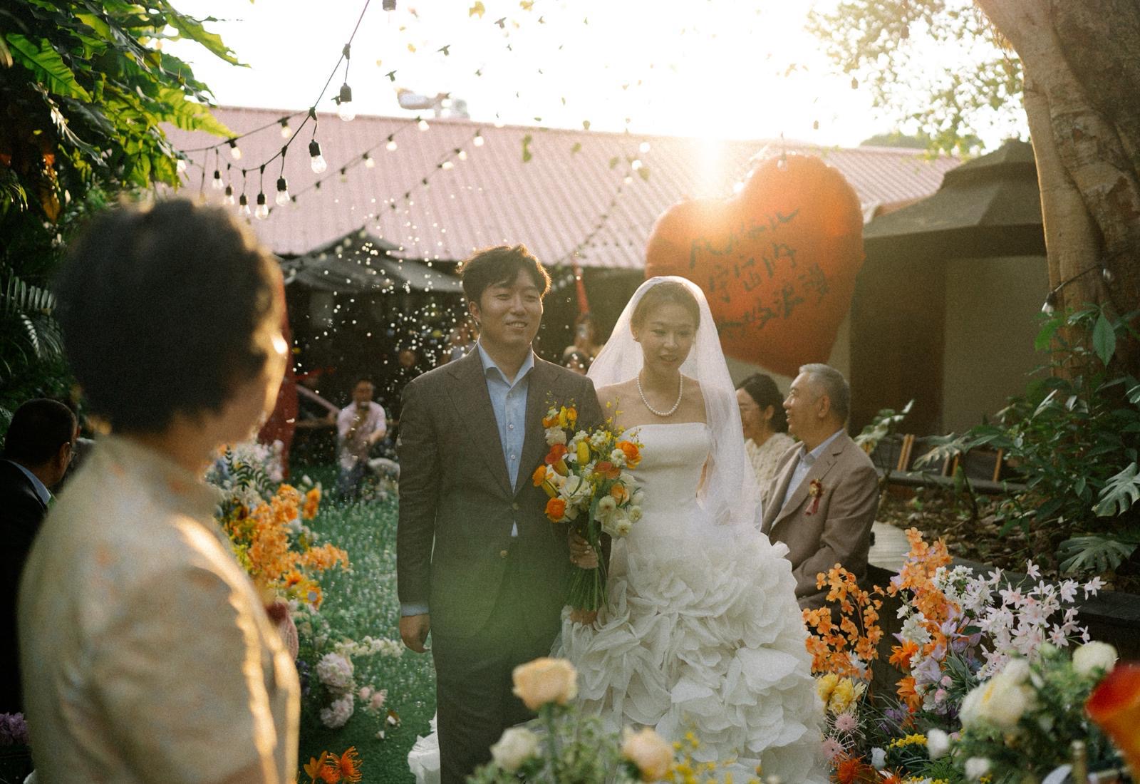 Garden wedding ceremony at Under Der Linden Wessex Estate